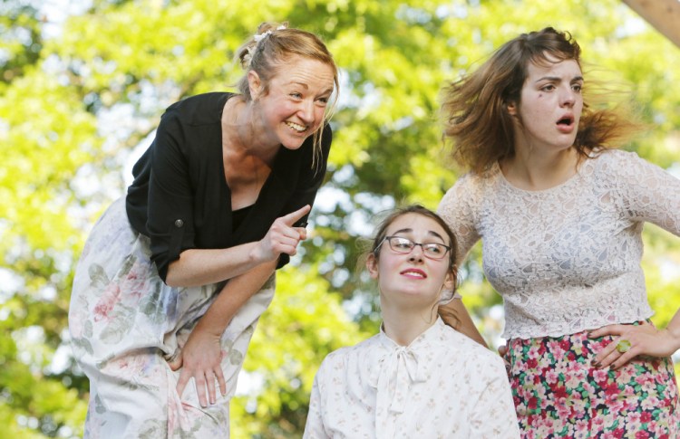Casey Turner, Elizabeth Coughlin and Catherine Buxton perform the scene "Tricking Beatrice" as the Fenix Theatre Company rehearses "Much Ado About Nothing" July 11 in Deering Oaks Park.