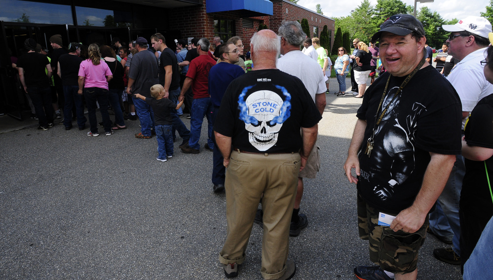 Fans wait to get into the Augusta Civic Center on Sunday for the WWE show.