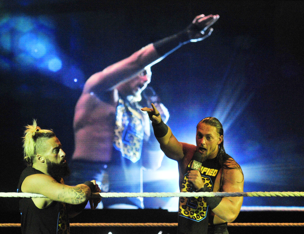 Enzo Amore, left, and Big Cass work the crowd before a tag team match Sunday against the Dudley Boys during the WWE show at the Augusta Civic Center.