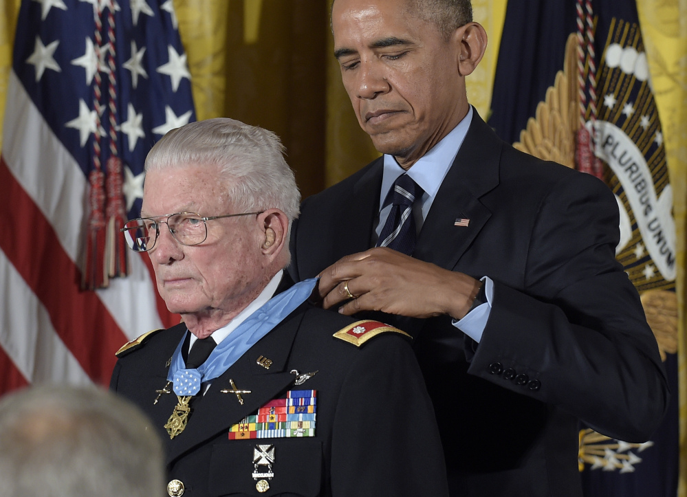 President Obama presents the Medal of Honor to retired Army Lt. Col. Charles Kettles of Michigan during a ceremony in the East Room of the White House on Monday.