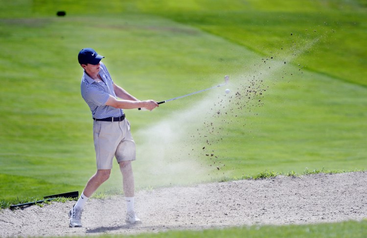 John Witt of Kennebunkport chips from a sand trap on the 18th hole during the Maine Junior Championship at Val Halla Golf Course in Cumberland on Tuesday, July 19, 2016.   Shawn Patrick Ouellette/Staff Photographer