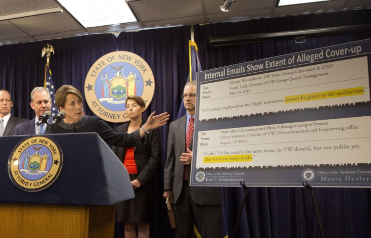 Massachusetts Attorney General Maura Healey, with New York Attorney General Eric Schneiderman (second from left), discusses a lawsuit against Volkswagen on Tuesday in New York. "This 'clean diesel' was nothing more than a dirty cover-up," she said.