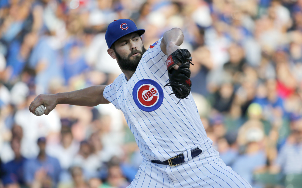 Chicago Cubs starting pitcher Jake Arrieta delivers during the first inning of a baseball game against the New York Mets Tuesday, July 19, 2016, in Chicago. (AP Photo/Charles Rex Arbogast)