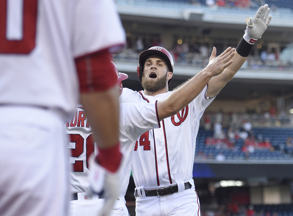 Washington's Bryce Harper celebrates his two-run homer in the first inning of an 8-1 win over the Los Angeles Dodgers Wednesday at Washington.