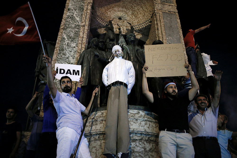 Supporters of Erdogan hang an effigy of Gulen during a pro-government demonstration Istanbul last week. 