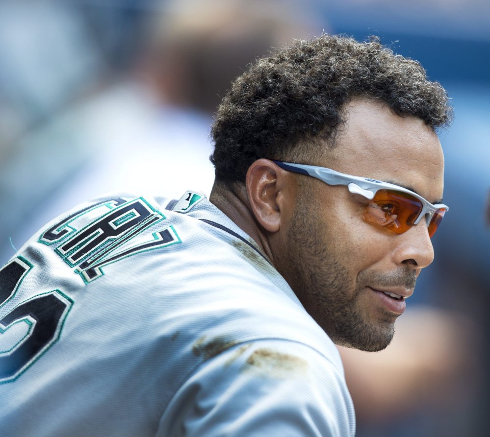 Seattle's Nelson Cruz has reason to smile Saturday after his ninth career grand slam helped the Mariners rout the Blue Jays in Toronto.