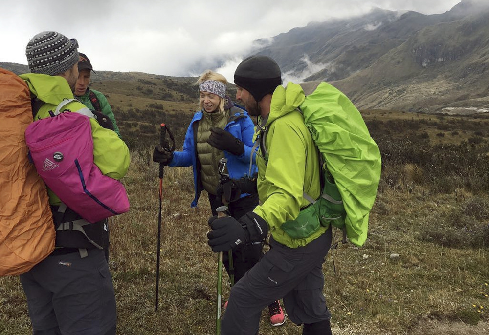 An uphill struggle doesn't faze Boston Marathon bombing survivor Adrianne Haslet, second from right, as she ascends Ecuador's Volcan Cayambe with a team of climbers and a guide, summitting the snow-capped mountain on Sunday with the help of a prosthetic leg.