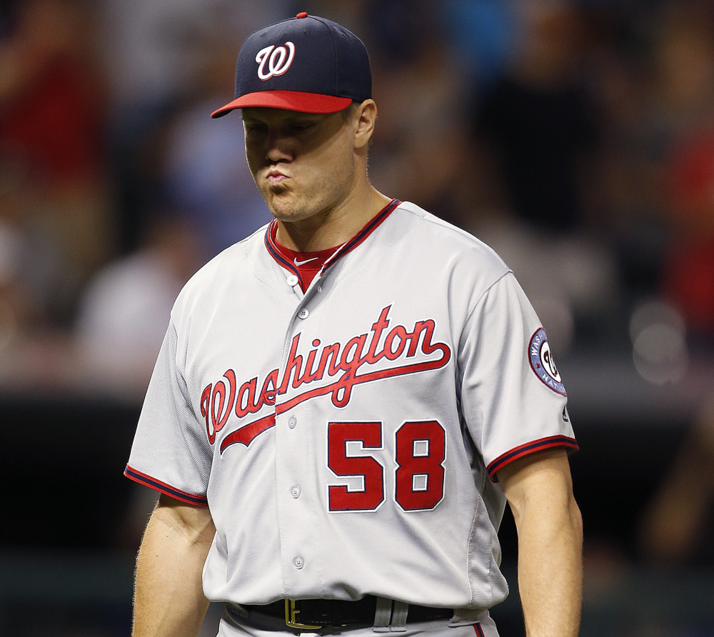 Jonathan Papelbon of the Washington Nationals was pulled Tuesday night after failing to get an out during Cleveland's winning three-run ninth inning.