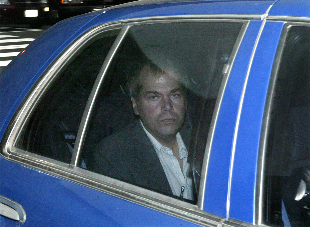 John Hinckley Jr. arrives at U.S. District Court in Washington in this 2003 file photo. A judge says Hinckley, who attempted to assassinate President Ronald Reagan will be allowed to leave a Washington mental hospital and live full-time in Virginia.