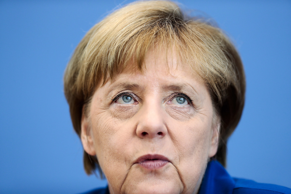 German Chancellor Angela Merkel addresses the media during a news conference in Berlin in July.