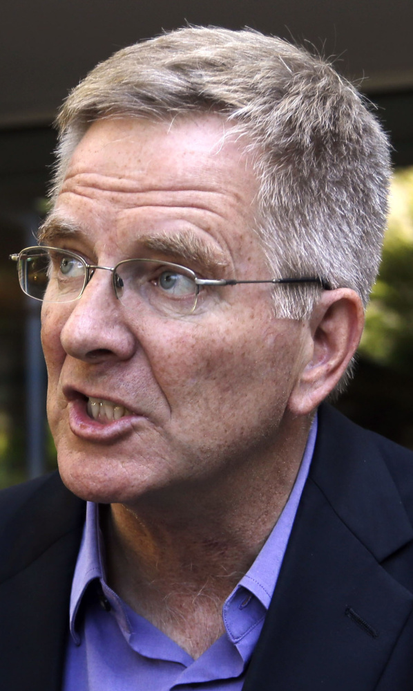Rick Steves, one of the country's most visible advocates of marijuana legalization, speaks during an interview in Portland, Ore., in this 2014 file photo. 