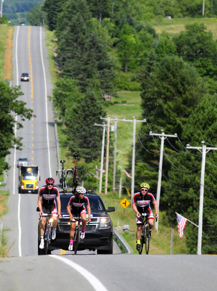 The Ride4Gabe team heads south Friday on U.S. Route 202 in Troy.