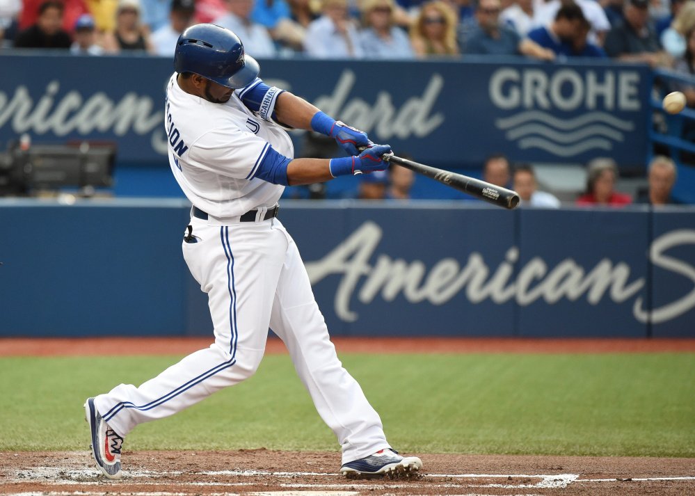 Toronto's Edwin Encarnacion homers during the Blue Jays' three-home run first inning Friday night against the Orioles. Toronto won 6-5 at home.