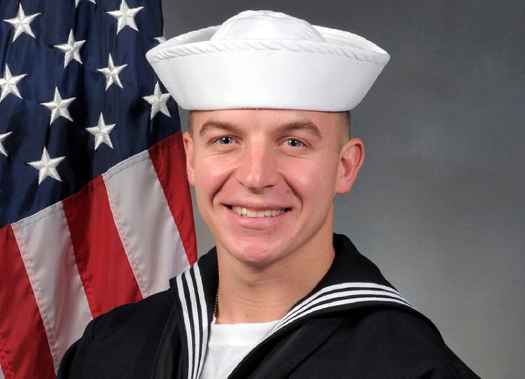 A coroner's report says Seaman James "Derek" Lovelace died after struggling to tread water in fatigues, boots and a dive mask filled with water in a heated pool, which ranged in depth from 4-to-15 feet. He was seen on surveillance video being dunked at least twice by an instructor, the report notes.