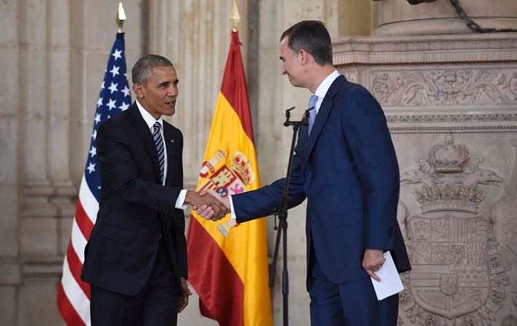 President Obama shakes hands with Spain's King Felipe VI at the Palacio Real de Madrid in Madrid, Spain on Sunday.