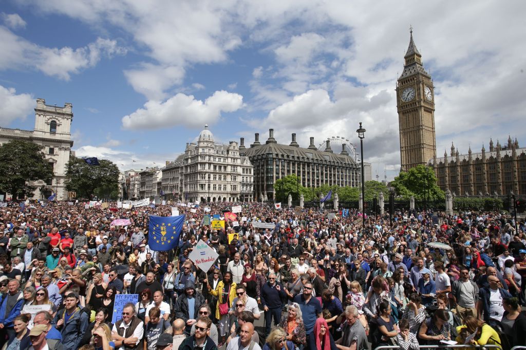 "Remain" supporters demonstrate Saturday in Parliament Square, London, to show their support for the European Union. At rear right is the Elizabeth Tower containing Big Ben. Daniel Leal-Olivas/PA via AP