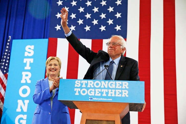 Sen. Bernie Sanders and Democratic presidential nominee Hillary Clinton appear at a rally in Portsmouth, N.H., in July. Andrew Harnik/Associated Press