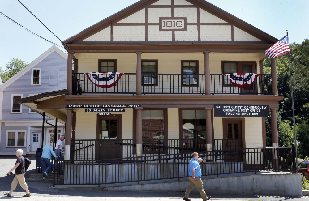 The unchanging character of the Hinsdale Post Office in New Hampshire is a bright spot for the small town, as many local businesses have shut down. It also serves as a gathering place.