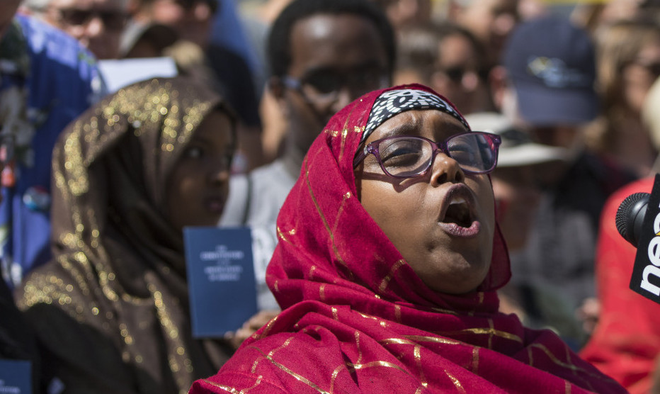 Deqa Dhalac, a leader at the Somali Community Center of Maine, speaks at a rally in Portland to protest anti-immigrant comments by Donald Trump. Immigration reform is necessary for the nation and Maine.