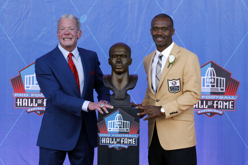 Former Indianapolis Colts wide receiver Marvin Harrison, right, poses with Colts owner Jim Irsay after Harrison was inducted into the Pro Football Hall of Fame on Saturday in Canton, Ohio.