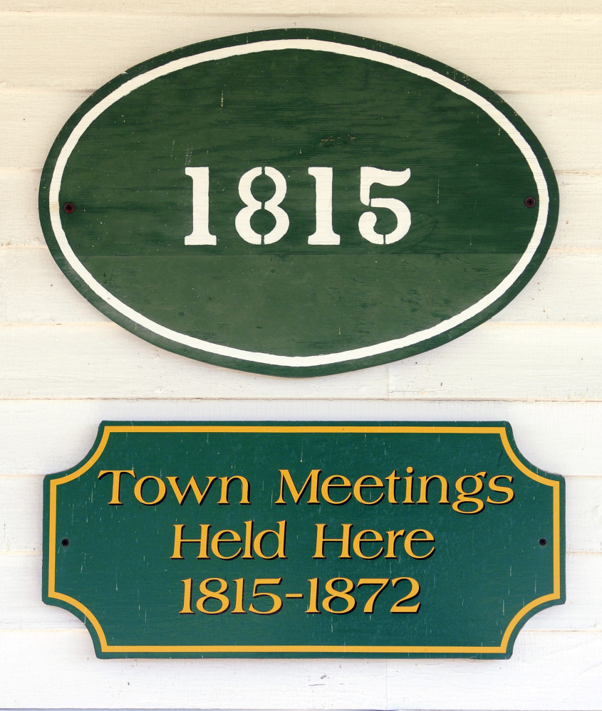 This sign tells the history of when town meetings were held in the Belgrade Townhouse, which the historical society is hoping to renovate for use as a headquarters.