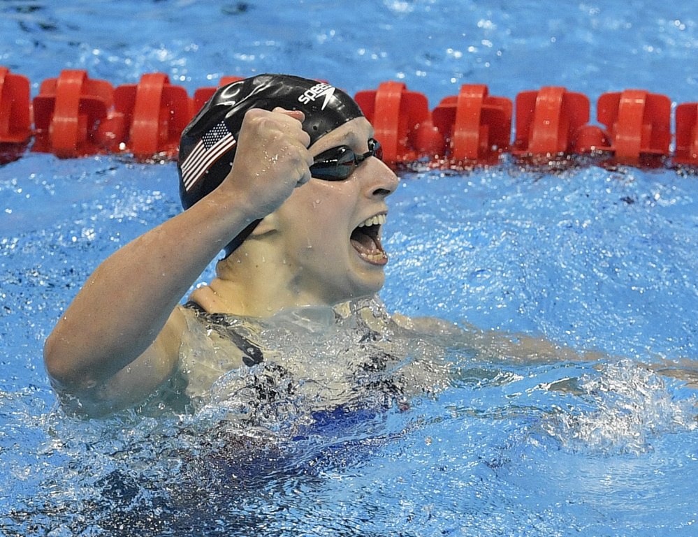 Katie Ledecky won the gold medal in the 400-meter freestyle in emphatic fashion – taking nearly two full seconds off her own world record.