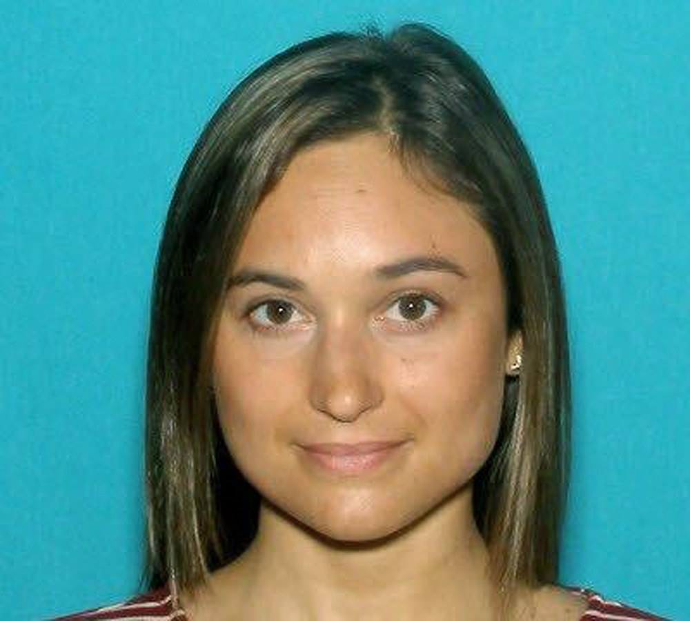 This undated driver's license photo released by the Worcester County District Attorney's Office shows Vanessa Marcotte, of New York, whose body was found Sunday night in the woods about a half-mile from her mother's home in the town of Princeton, Mass., about 40 miles west of Boston.