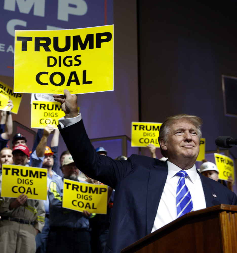 Republican presidential candidate Donald Trump seeks coal worker's votes Wednesday at a rally in Abingdon, Va.