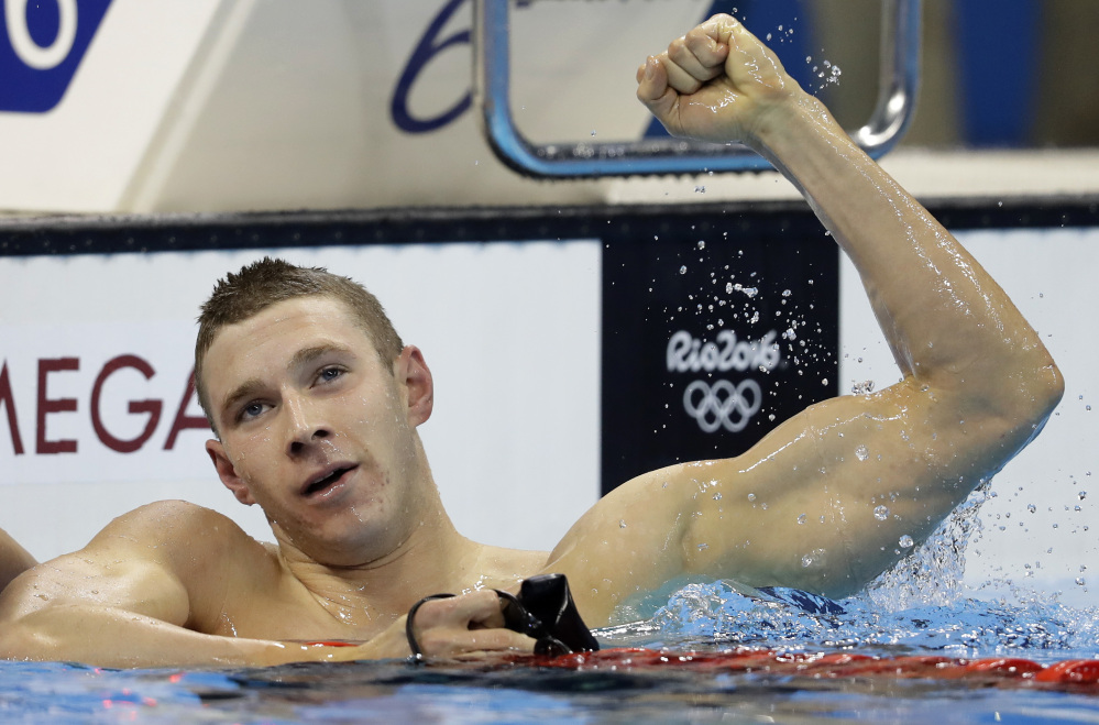 Ryan Murphy of the United States celebrates after winning the gold medal in the men's 200-meter backstroke final at the 2016 Summer Olympics Thursday in Rio de Janeiro.