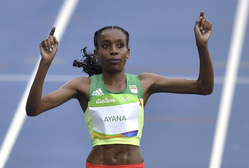 Ethiopia's Almaz Ayana celebrates winning the women's 10,000-meter final during the 2016 Summer Olympics at Rio de Janeiro, on Friday. Associated Press/Martin Meissner