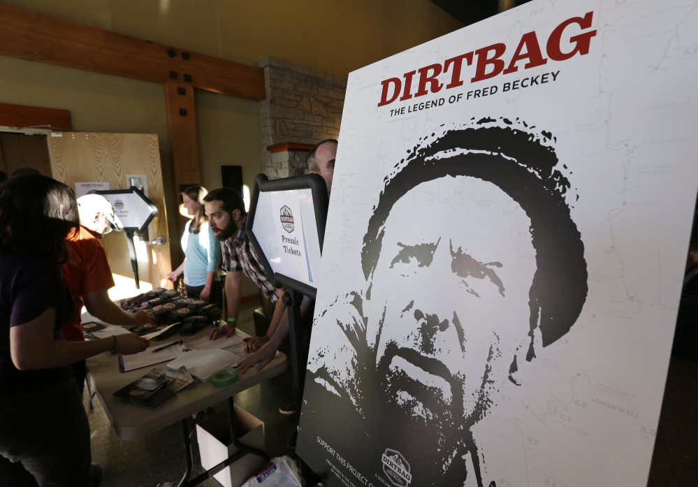 A poster for "Dirtbag: The Legend of Fred Beckey"  is displayed in Seattle. 
AP Photo/Ted S. Warren