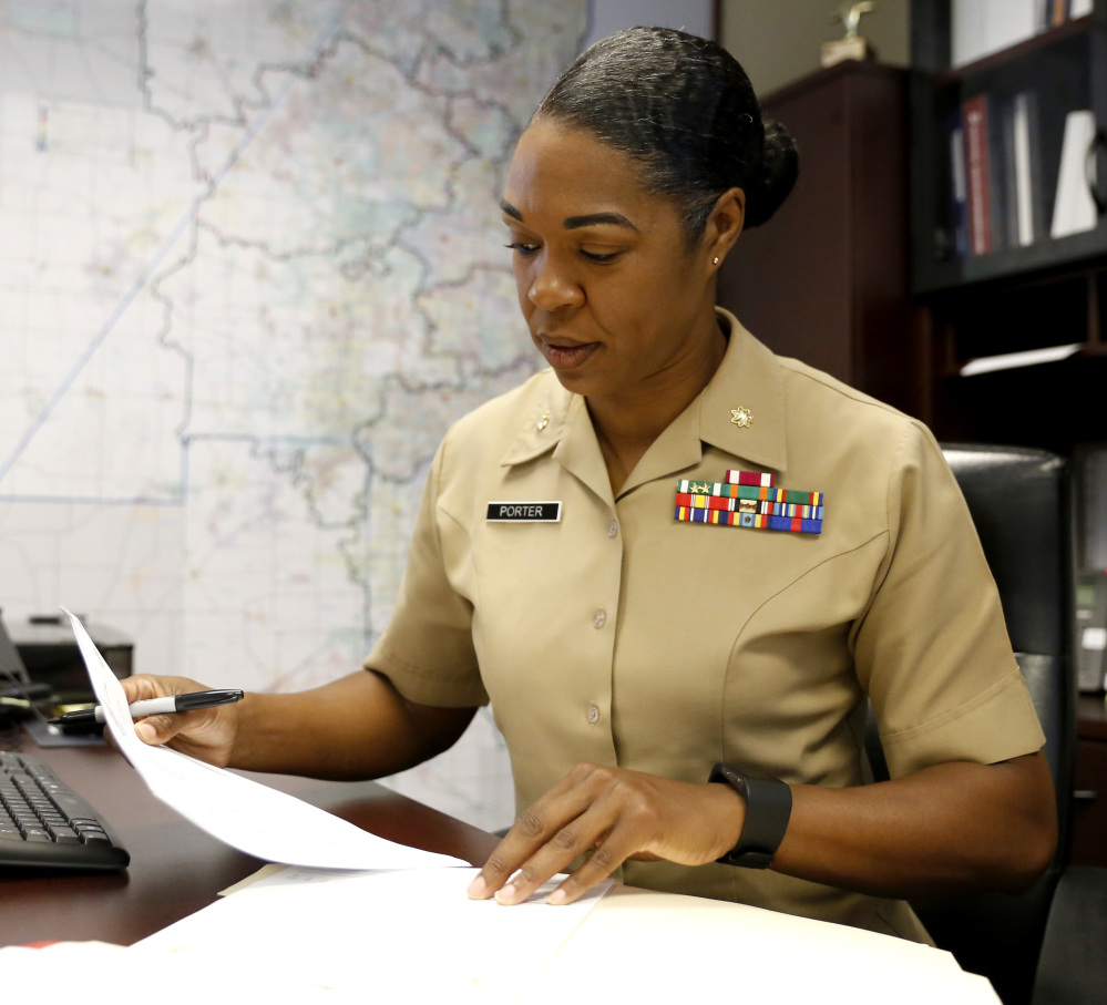 Maj. Shanelle Porter, commanding officer at the Recruiting Station Chicago works in her office in Des Plaines, Ill. Women who want front-line roles, she said, wish to be pioneers.