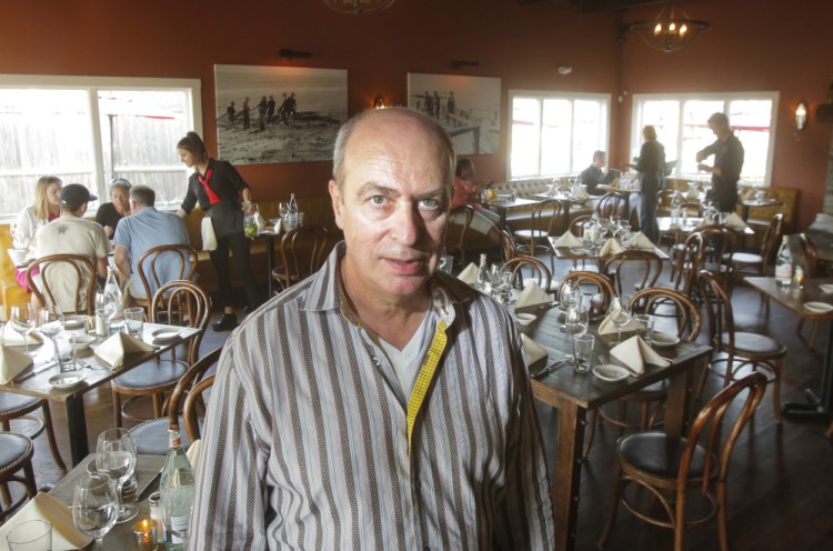 Sante Calandri, who owns Ports of Italy restaurants in Boothbay and Kennebunk, says that finding workers this summer has been challenging.