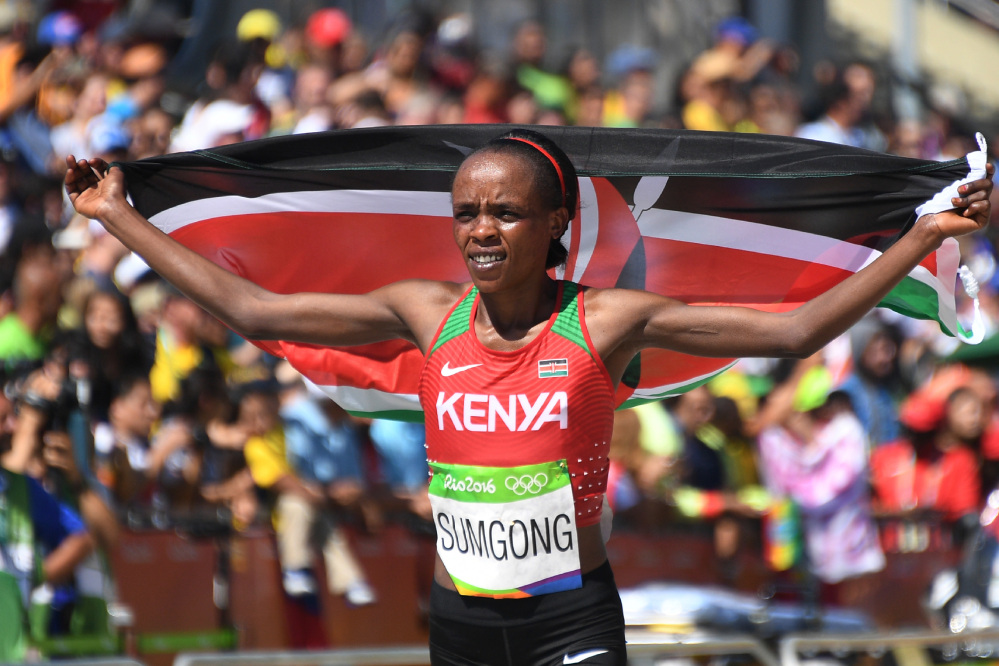 Kenya's Jemima Jelagat Sumgong celebrates winning the women's marathon during the Summer Olympics Sunday in Rio de Janeiro.
