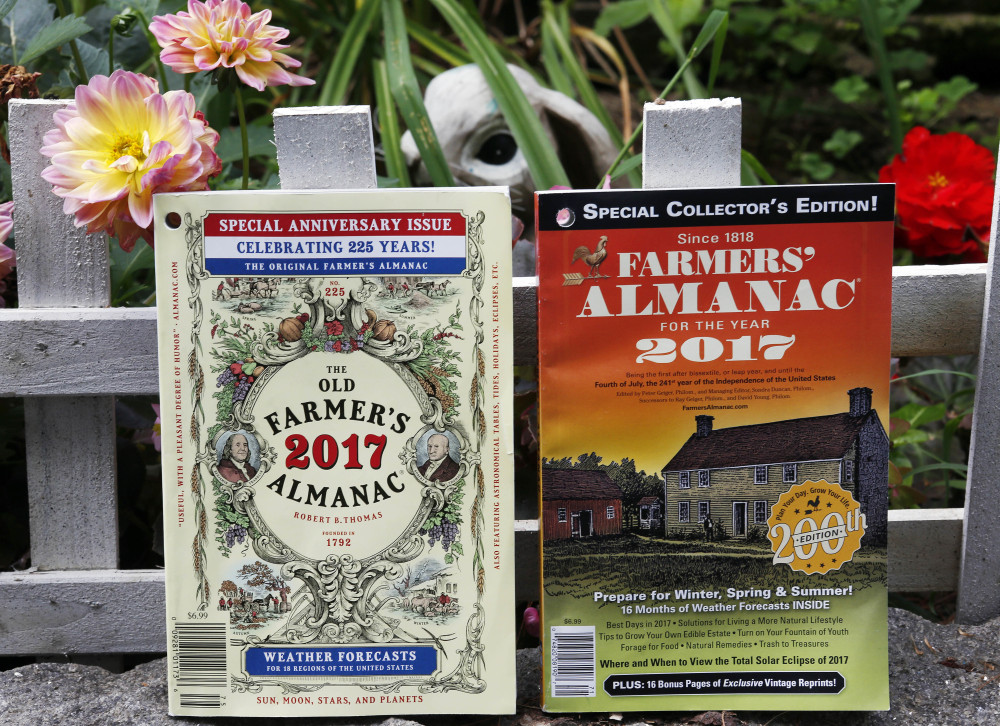 The 2017 editions of New Hampshire's Old Farmer's Almanac, left, and Maine's Farmers' Almanac photographed in Concord, N.H. The two publications, which will be released soon, are both celebrating milestones. Maine's 200 edition, and New Hampshire's 225.