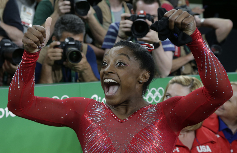 United States' Simone Biles celebrates after her winning gold in the vault at the 2016 Summer Olympics in Rio de Janeiro on Sunday.
Associated Press/Rebecca Blackwell