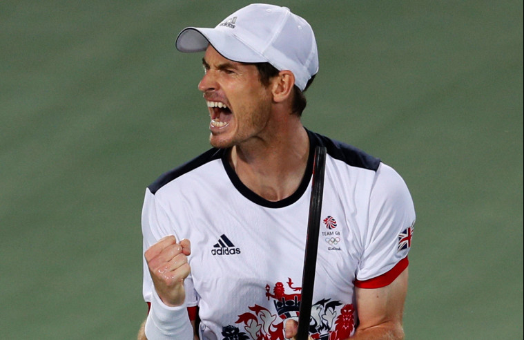 Andy Murray of Great Britain screams after winning the first set against Juan Martin del Potro of Argentina in the gold medal match of the men's singles tennis competition at the 2016 Summer Olympics in Rio de Janeiro, Brazil, on Sunday.