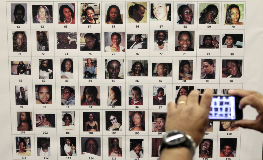 Photographs found in the home of Lonnie Franklin Jr. are shown at a police news conference in Los Angeles. 