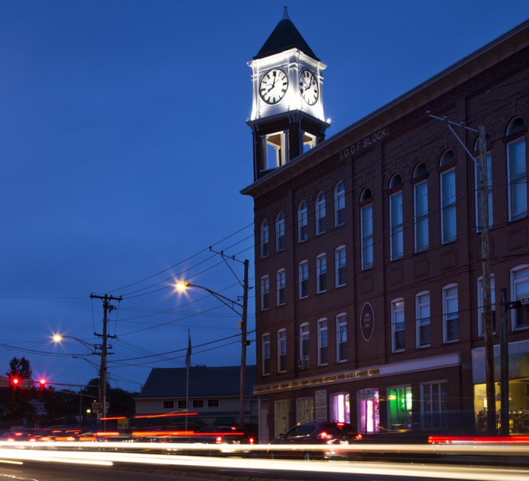The restored clock tower at Woodfords Corner in Portland is keeping time again for the first time in nearly two decades. Some hope the restoration will set the tone for the corner's rebirth.