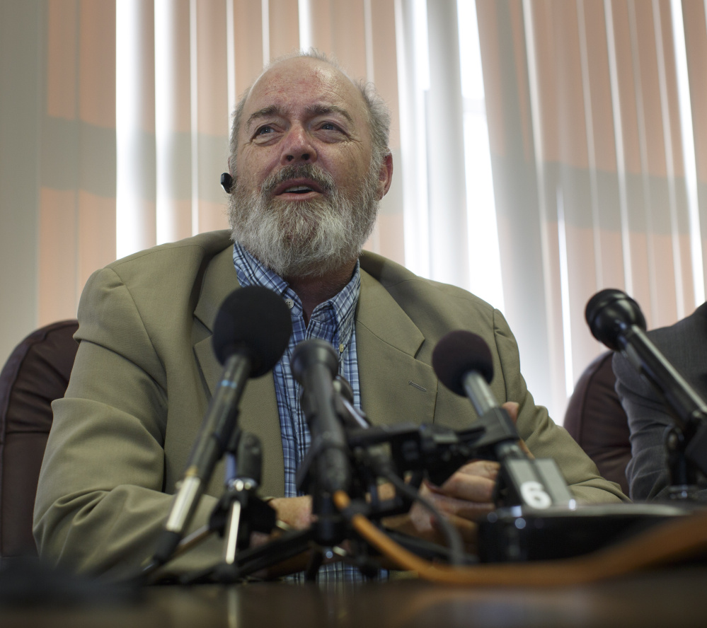 Attorney Mitchell Garabedian holds a news conference Monday to announce a $1.2 million settlement with the Diocese of Portland for six sex abuse victims of the Rev. James Vallely. Victim Lawrence Gray, left, who was abused beginning in 1958, also spoke during the news conference.