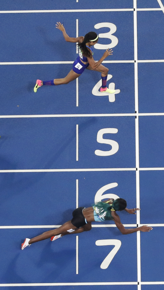 Associated Press/Matt Slocum
In this overhead shot, Shaunae Miller of the Bahamas dives across the finish line ahead of Allyson Felix of the U.S. to win the gold medal in the 400 meter finals.