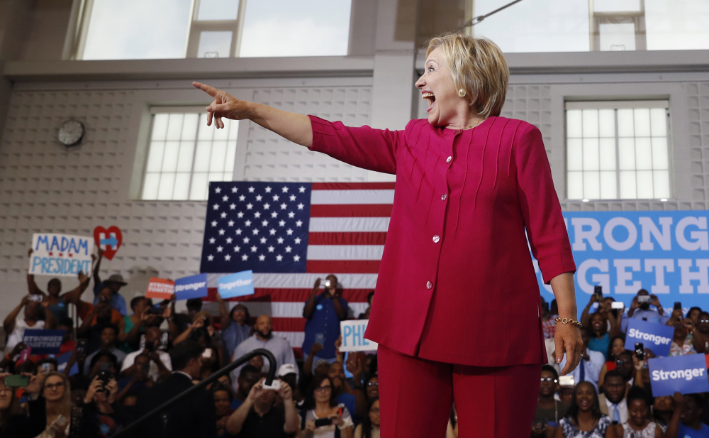 Democratic presidential candidate Hillary Clinton reacts to the cheering crowd as she arrives at a Pennsylvania Democratic Party voter registration event at West Philadelphia High School. Congress Tuesday receives notes from the FBI's interview with Clinton regarding her private email server.