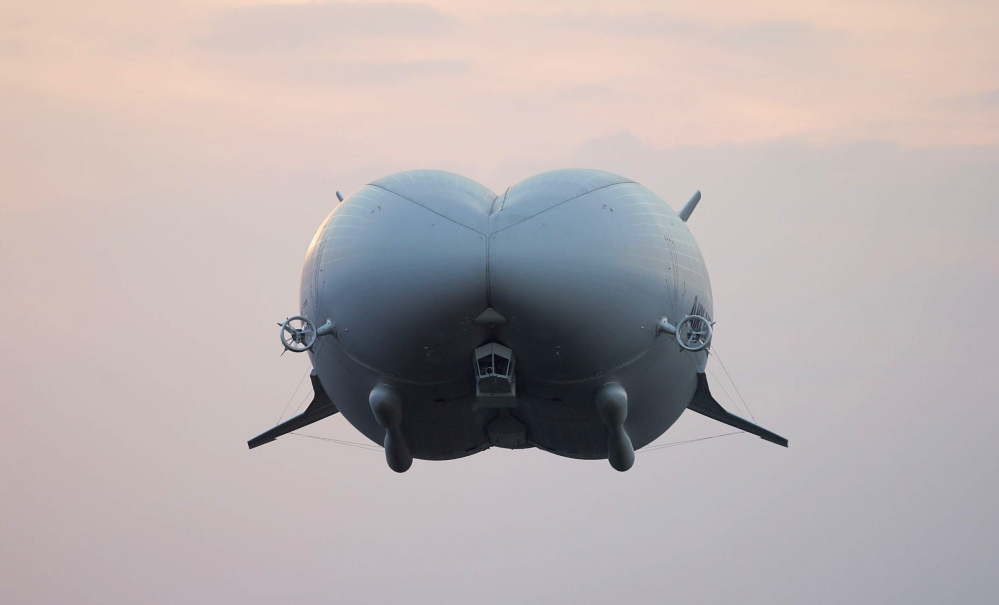 Considered the world's largest aircraft, the 302-foot Airlander 10 takes off Wednesday in central Britain.