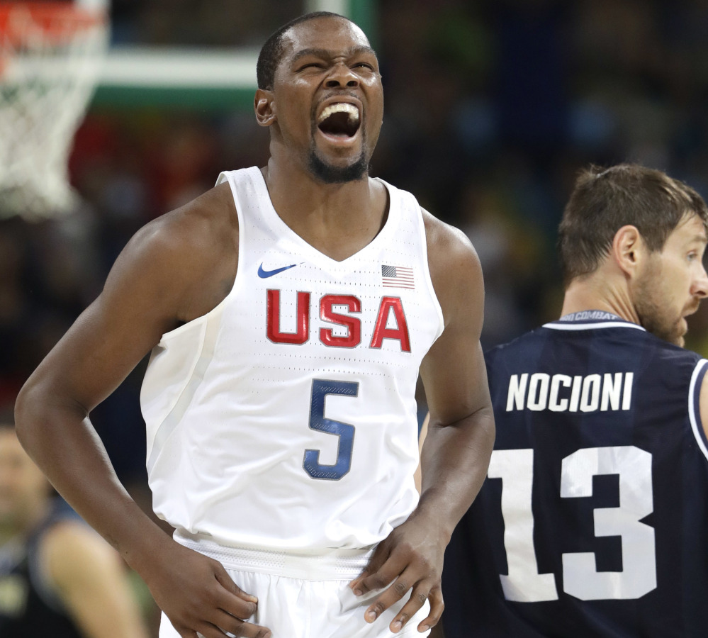 Kevin Durant, who finished with 27 points for the U.S., reacts after scoring Wednesday night during the 105-78 victory against Argentina in the men's basketball quarterfinals at the Olympics.