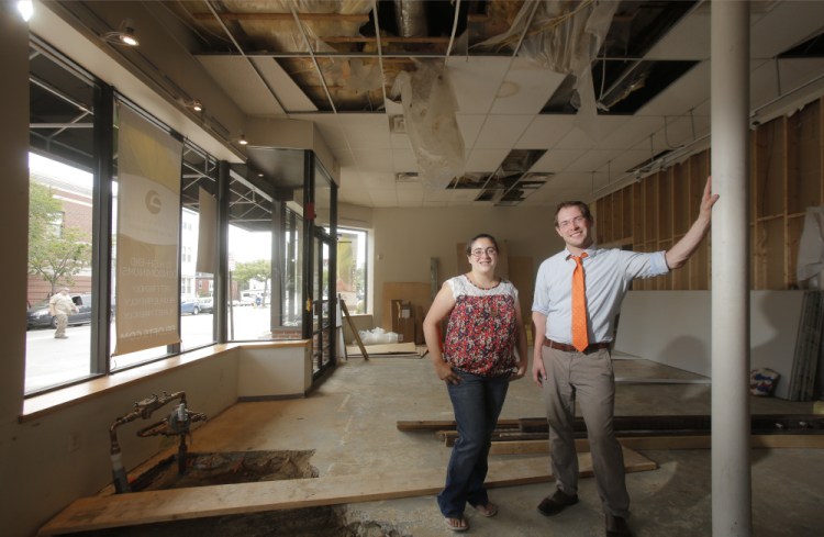 Emily Russo and Josh Christie stand in the East End space, formerly occupied by the Angela Adams retail store, that will house Print: A Bookstore.