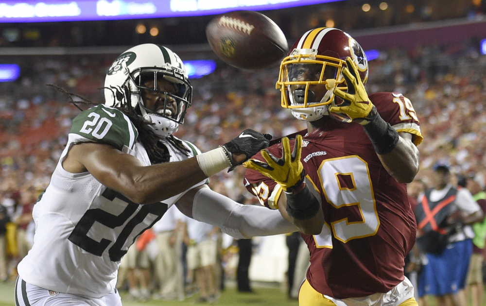 New York Jets cornerback Marcus Williams can't stop a touchdown catch by Washington wide receiver Rashad Ross during the first half of Friday's preseason game in Landover, Md., won by Washington,  22-18.