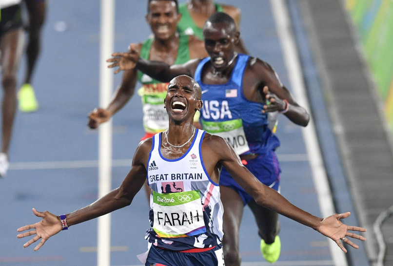 Britain's Mo Farah wins the gold medal in the men's 5,000 meters, finishing just ahead of surprise silver medalist Paul Chelimo of the United States.