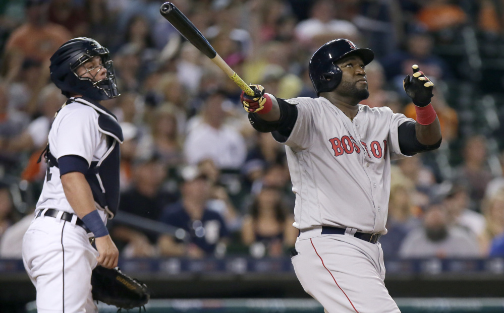 David Ortiz of the Boston Red Sox and Detroit catcher James McCann watch Ortiz's two-run homer in the fifth inning Saturday night that helped produce a 3-2 victory.