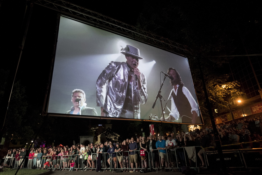 The Tragically Hip's frontman Gord Downie is displayed on a screen during a public viewing of the band's final concert Saturday.
