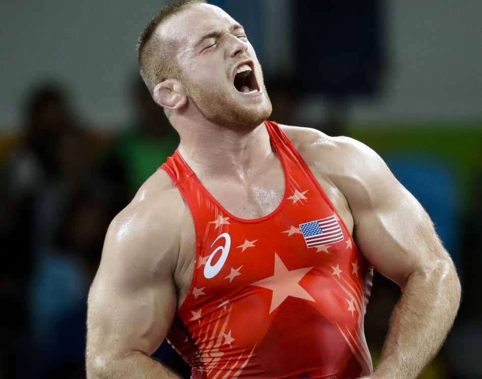 Kyle Snyder of the U.S. celebrates after winning his semifinal match in the 97-kilogram freestyle wrestling division on his way to a gold medal.